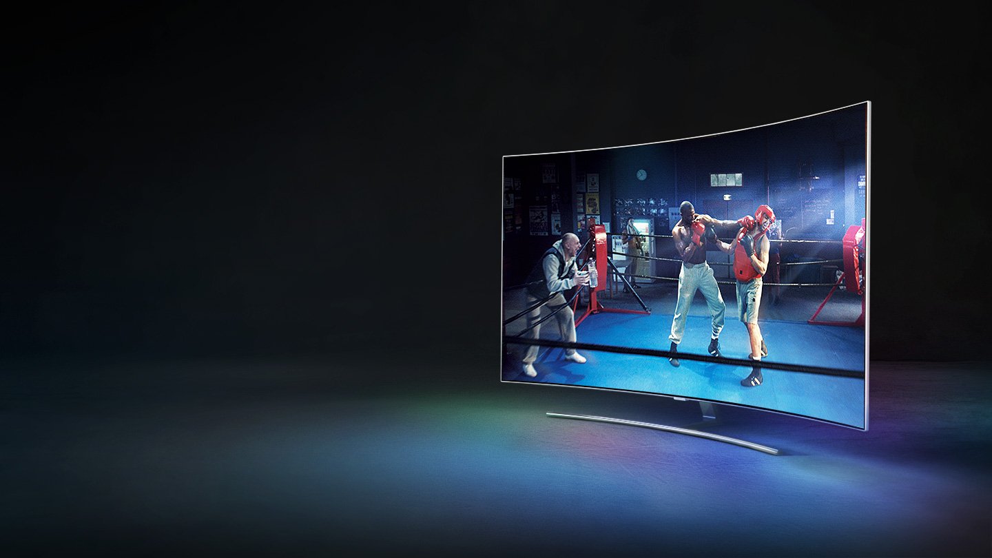 QLED TV Q8C has been placed on the right side of the room with an impression of space and the image of boxing.