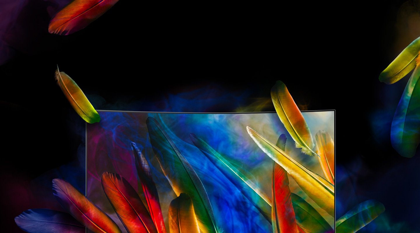 Curved QLED TV has been placed with front face, and feathers of various colors are falling into the screen. Colorful feathers have been shown on QLED TV’s screen as the fallen feathers have been reflected.