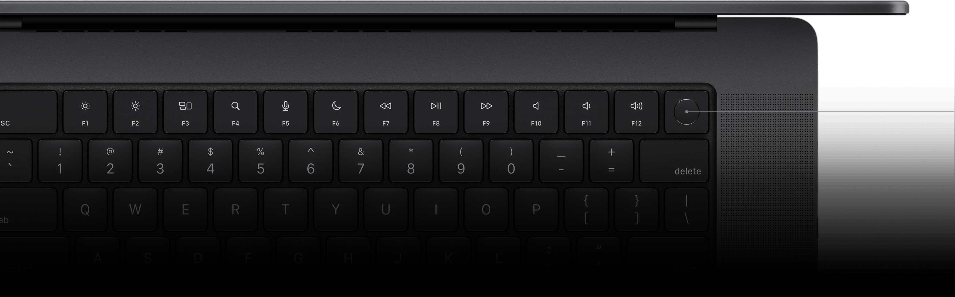 Pointer showing the Touch ID key on the Magic Keyboard.
